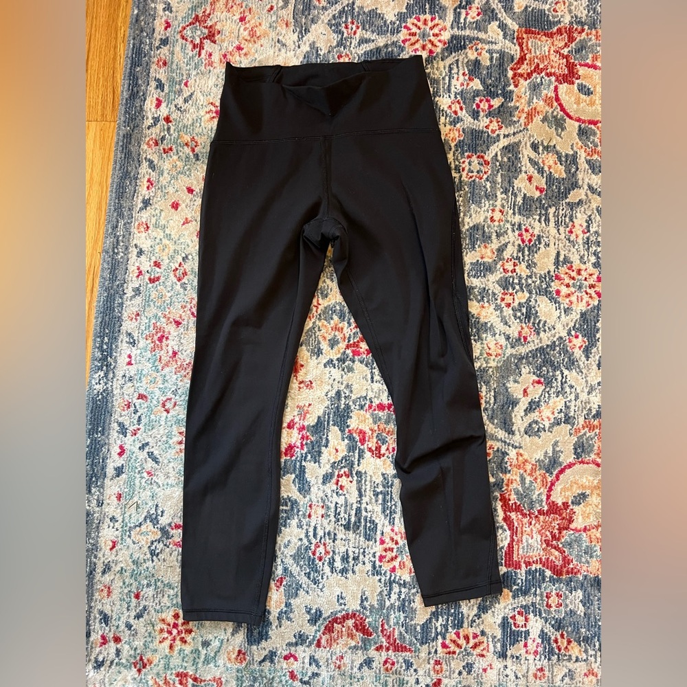 Black lululemon leggings with mesh sides